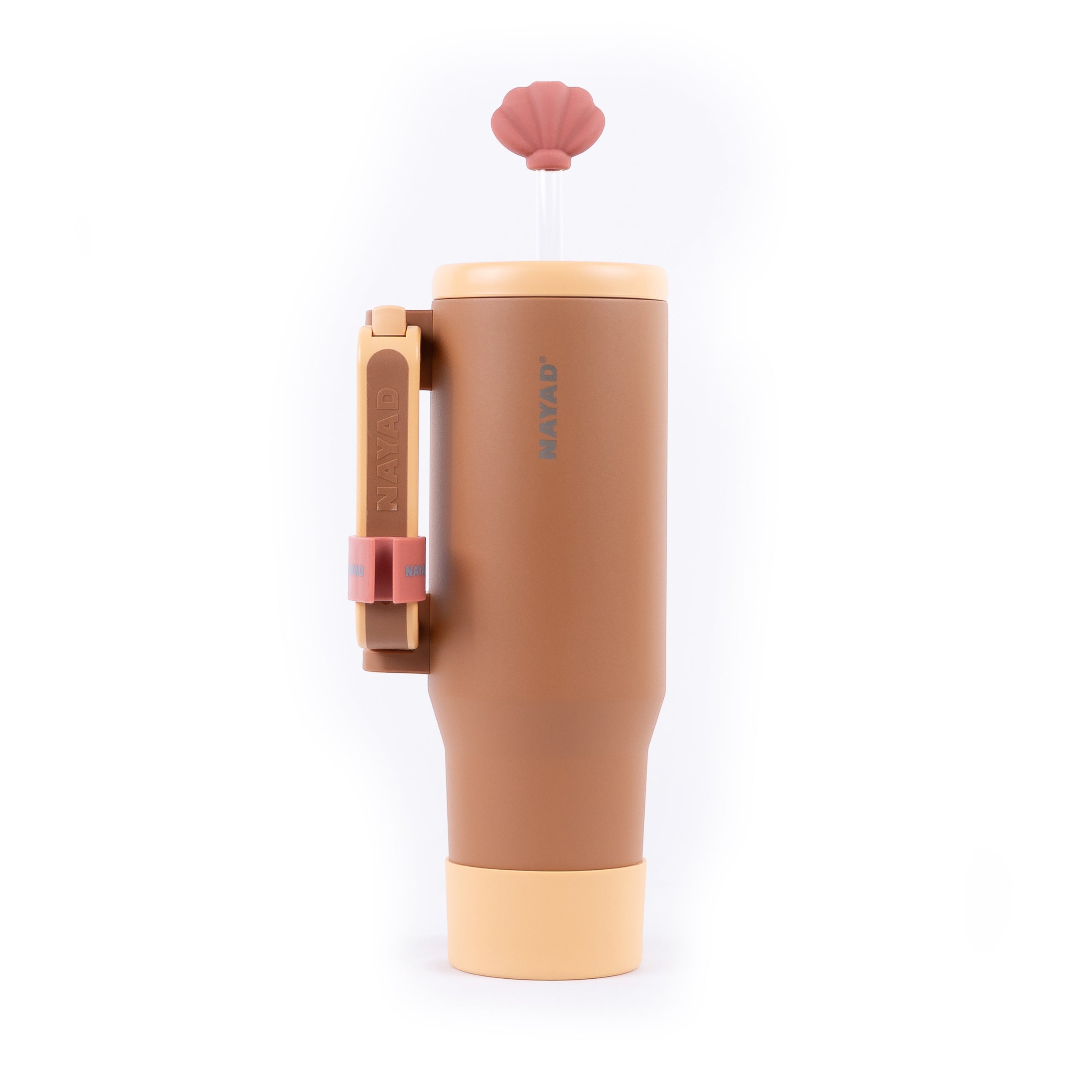 Brown tumbler with pink lid and handle on a white background