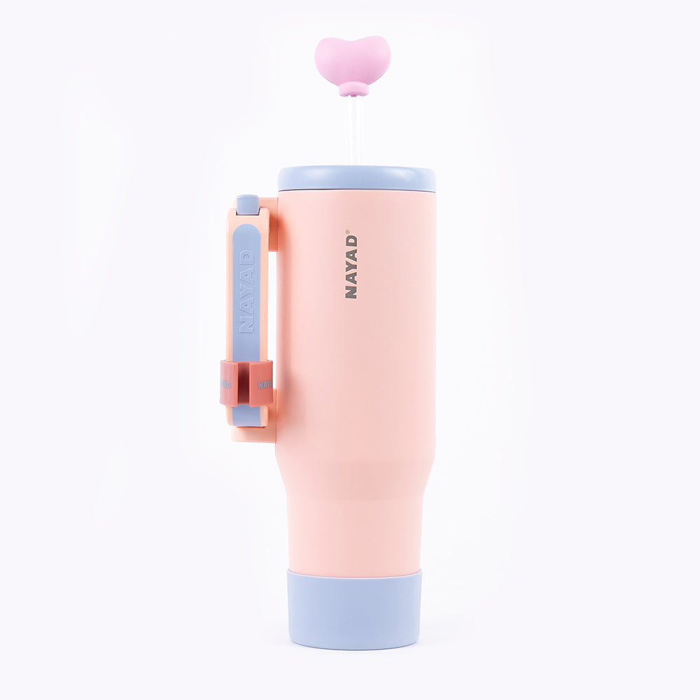 Pink and blue water bottle with a small pink ball on a white background