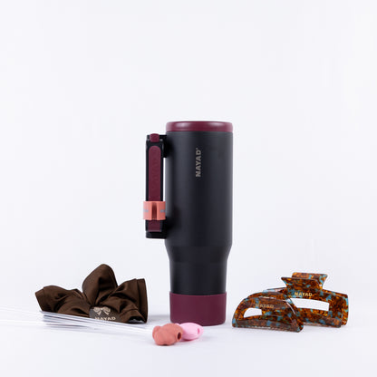 Black Hydrocore Nayad water tumbler with hair clips and comb and straws