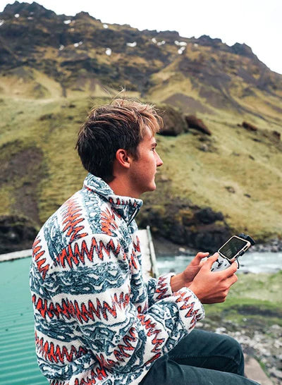 Guy looking about holding a controller