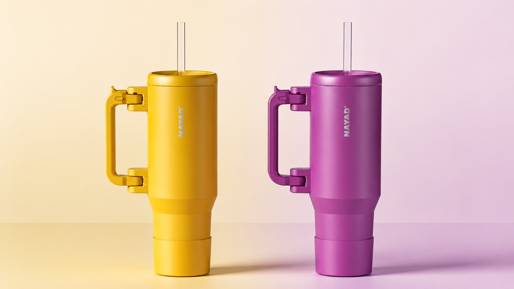 Yellow and purple tumblers with handles and straws on a gradient background