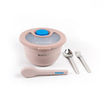 Collapsible bowl with spoon, fork, and blue salad dressing container on a white background