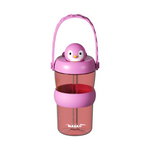 A pink and translucent pink water bottle with a cute penguin lid, a pink carrying handle, and a clear lower cup section. The brand name 'MAYA D' is printed near the bottom.