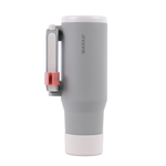 Gray tumbler with a lipstick holder on the handle on a white background