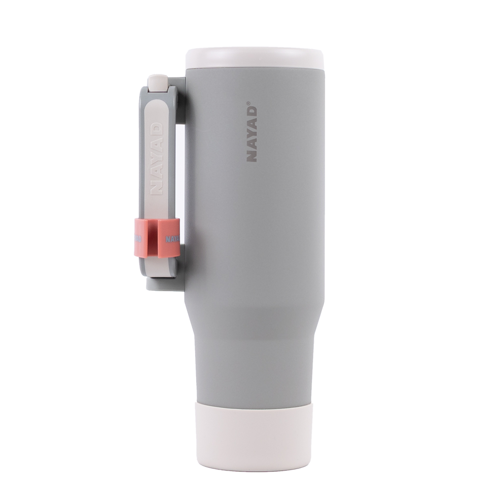 Gray tumbler with a lipstick holder on the handle on a white background