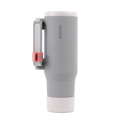 Gray tumbler with a lipstick holder on the handle on a white background